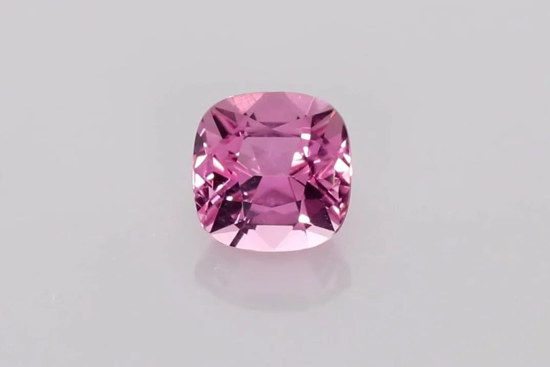 A 1.02 carat cushion cut pink tourmaline gemstone.