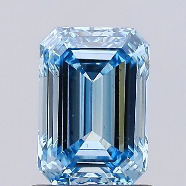 A 1.04 carat emerald cut fancy vivid blue lab grown diamond.