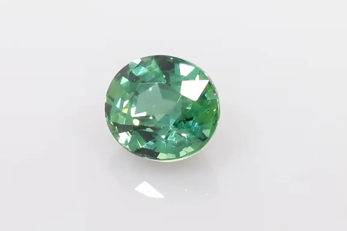 2.07ct Oval Natural Sapphire (Colour Multicolor, Clarity Slightly Included, Cut Faceted)