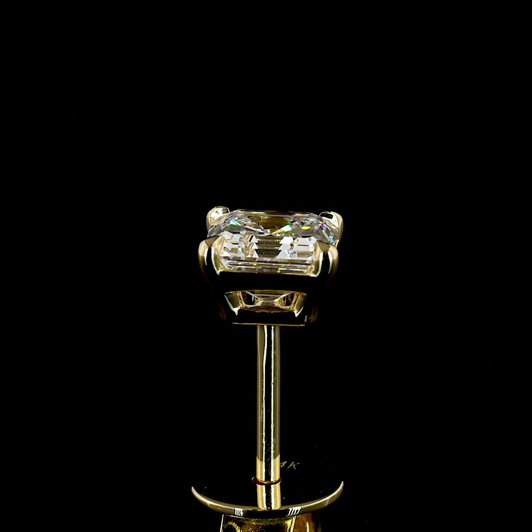 1.03ctw lab grown asscher diamond stud earrings in 14k yellow gold.