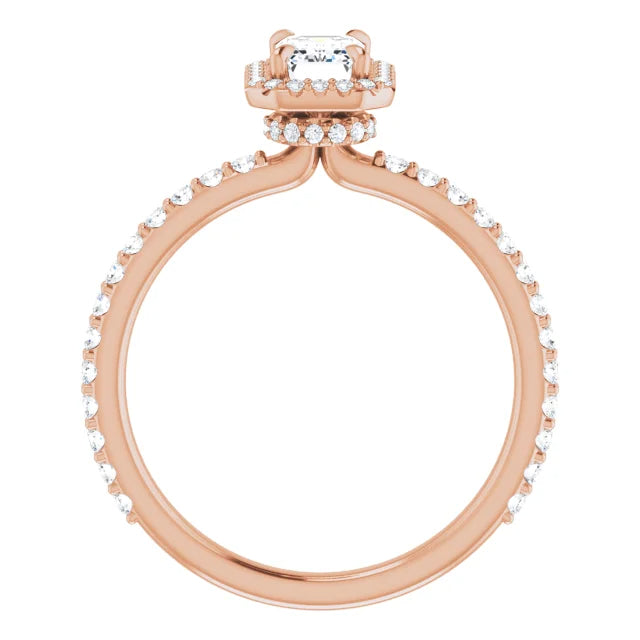 Emerald cut diamond engagement ring with a pavé halo and diamond band.