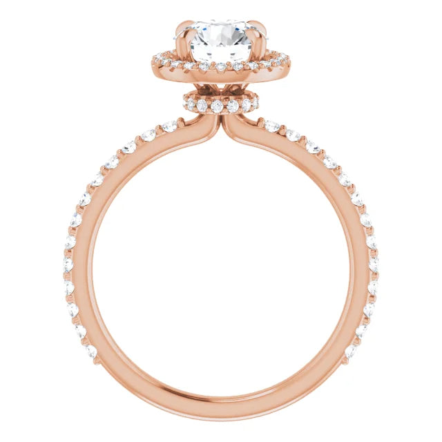 Rose gold engagement ring with a round diamond center, halo, and pavé band.