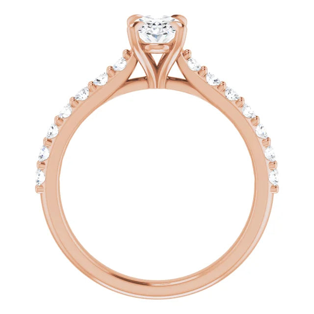 Oval natural pavé setting with a solitaire diamond and rose gold band.