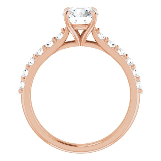 Rose gold ring with a round center stone and pavé diamonds on the band.