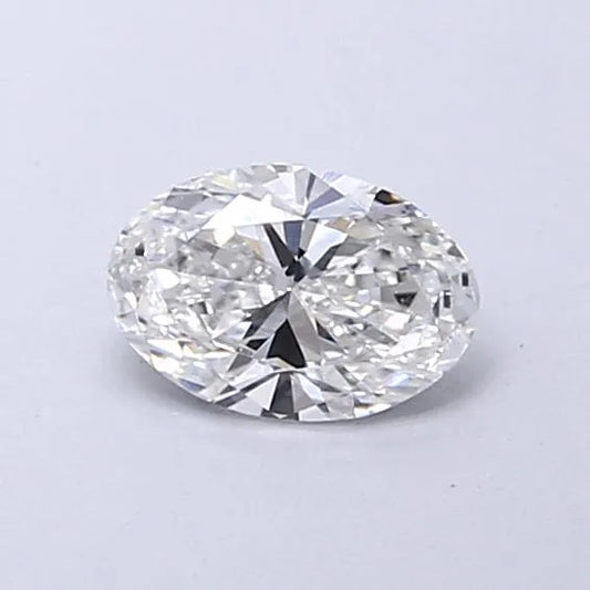 0.33 carat oval lab grown diamond with E color and VS1 clarity.