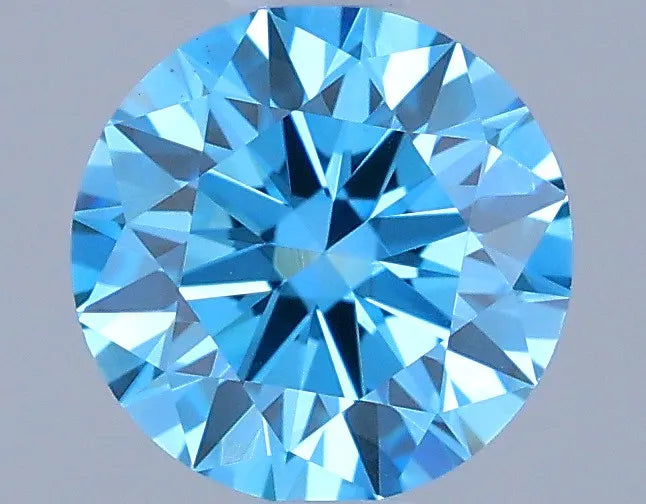 A round, fancy vivid blue lab grown diamond with VS1 clarity.