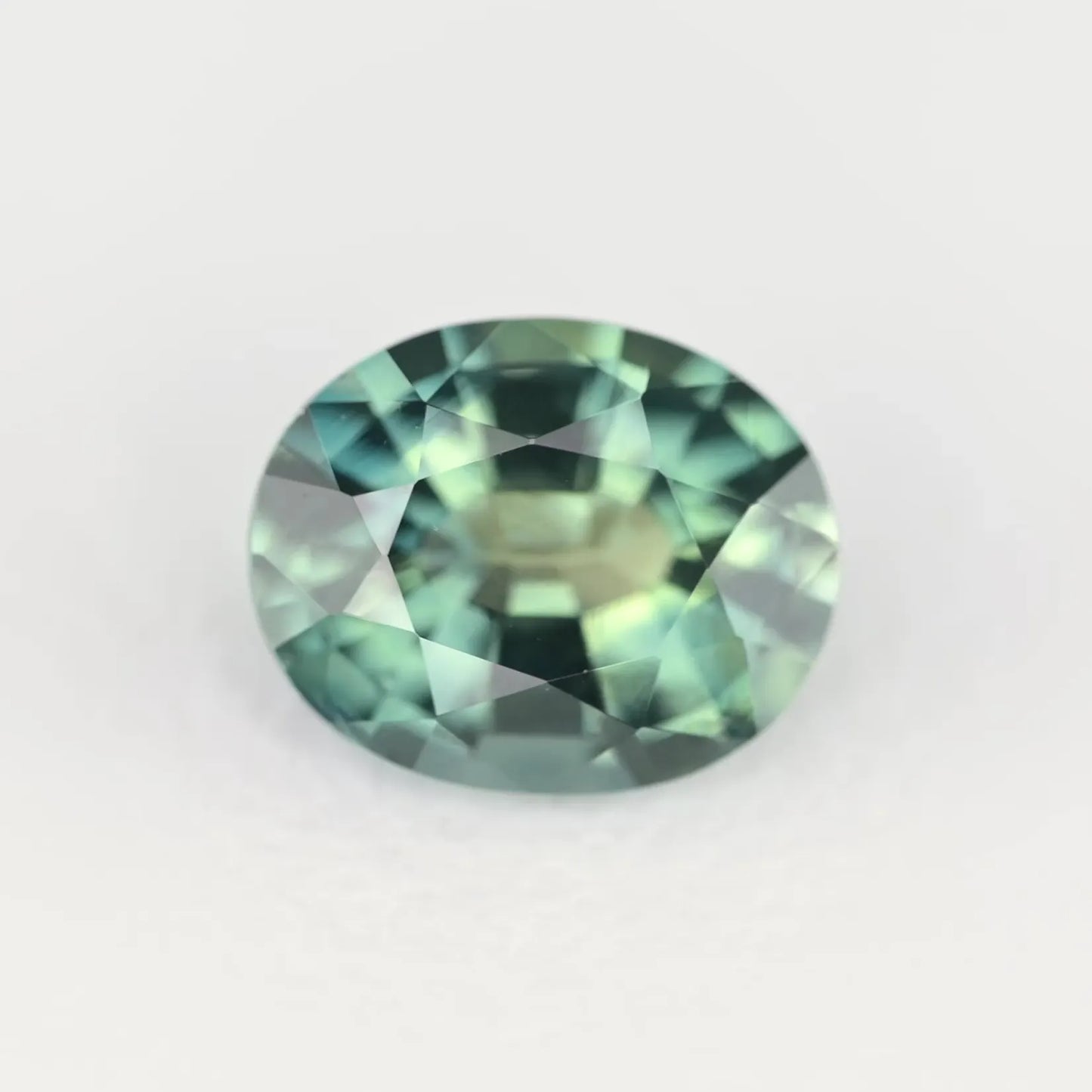 0.61ct Oval Natural Sapphire (Colour Teal, Clarity Eye Clean, Cut Faceted)