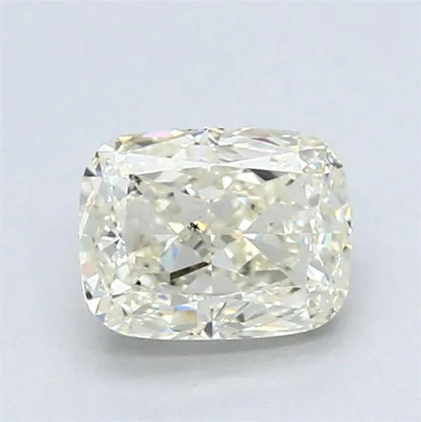A 1.01 carat cushion brilliant natural diamond with color M and clarity SI2.