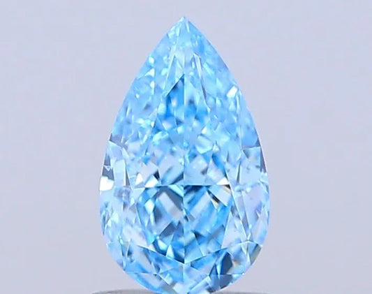 A 1.01 carat pear-shaped fancy vivid blue diamond with VS1 clarity.