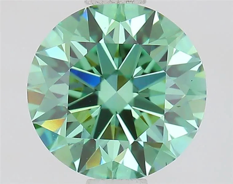 A 1.03 carat round lab grown diamond with fancy vivid green color and VS1 clarity.