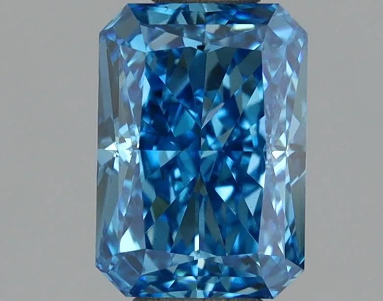 A 1.05 carat radiant cut fancy vivid blue VS2 lab grown diamond.