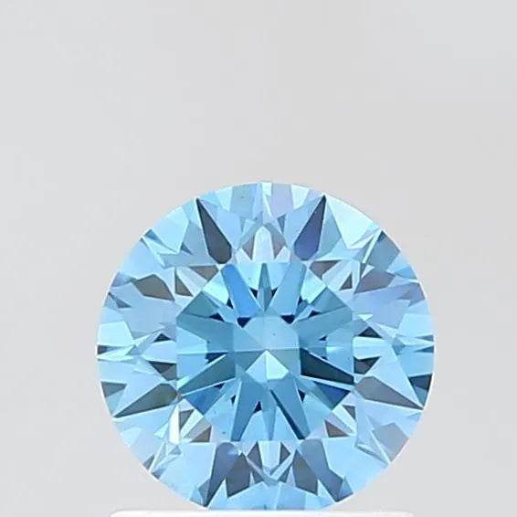 A round, fancy vivid blue lab grown diamond with VVS2 clarity.