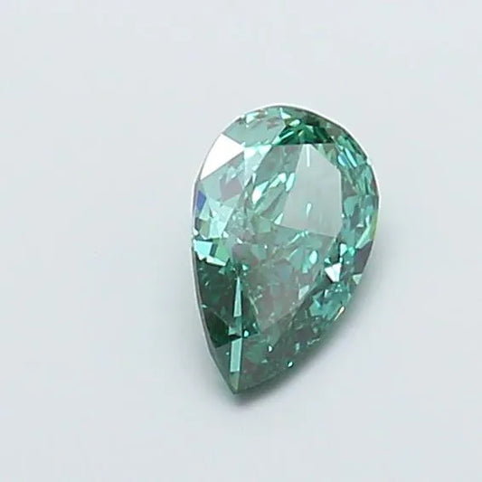 A 1.16 carat pear-shaped fancy vivid green lab-grown diamond with VVS2 clarity.
