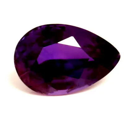 A faceted pear-shaped natural purple sapphire.