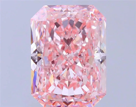 A 10.58 carat radiant cut lab grown diamond with fancy vivid pink color and VS2 clarity.