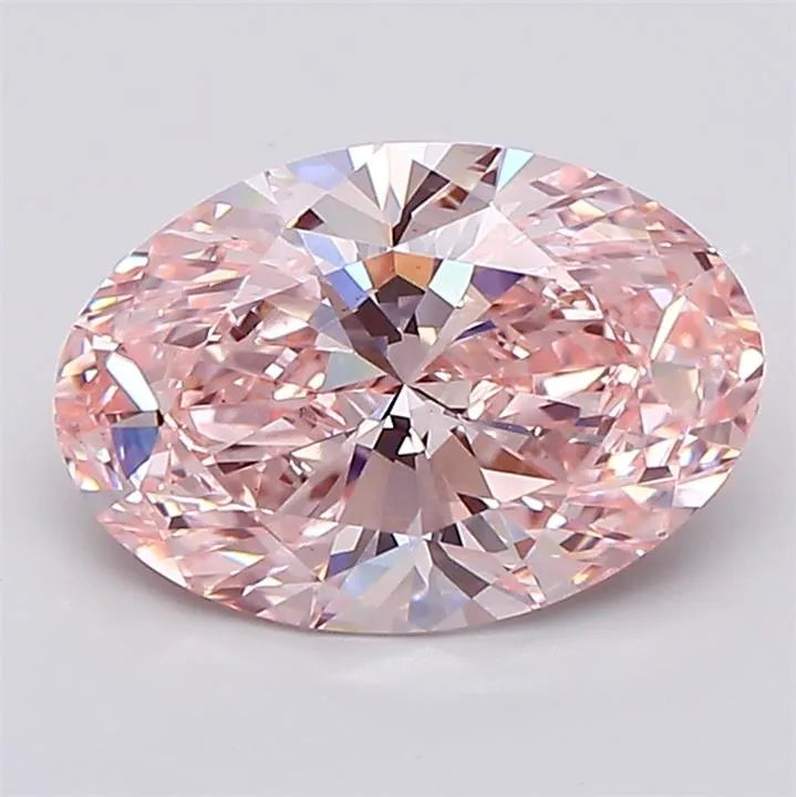 A 2.63 carat oval fancy intense pink lab grown diamond with VS1 clarity.