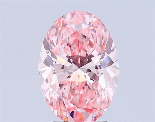 A 3.02 carat oval fancy vivid pink lab grown diamond with VS1 clarity.