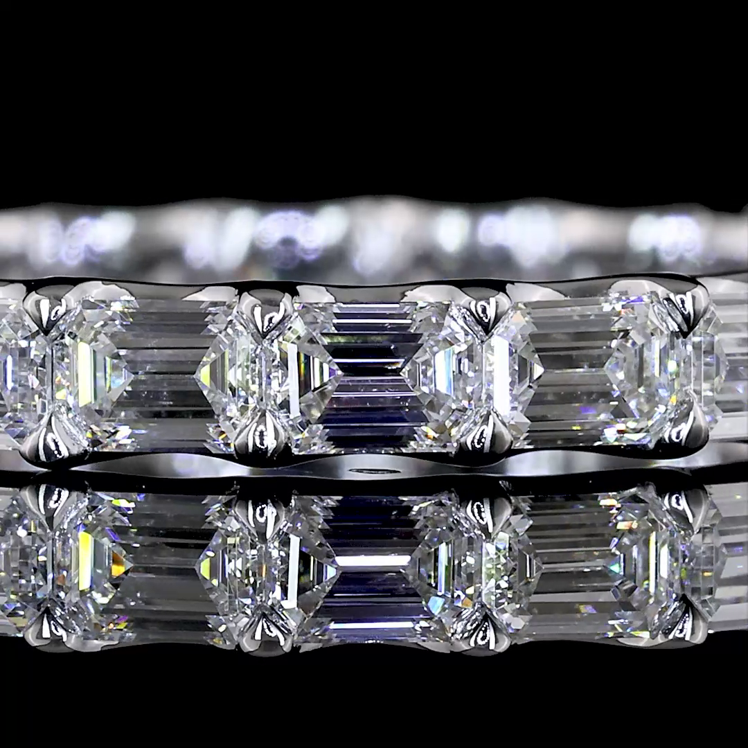 Lab grown emerald cut diamond eternity band in 14k white gold.