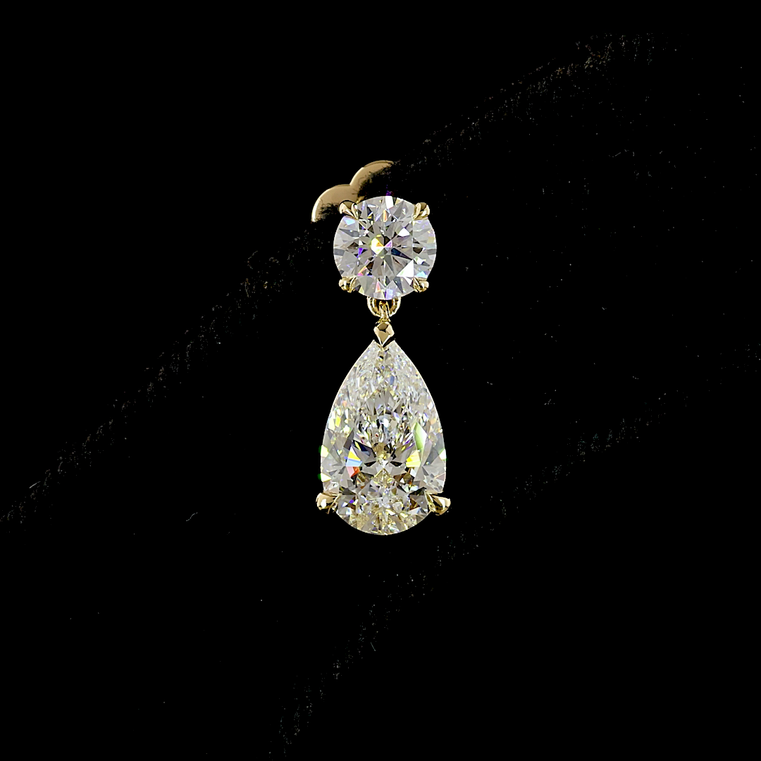 2.90ctw lab grown diamond drop earring with round and pear cut stones in 14k yellow gold.