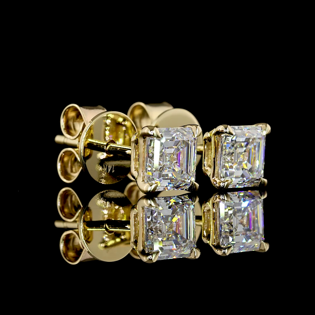 1.03 ctw lab grown asscher diamond stud earrings in 14k yellow gold.