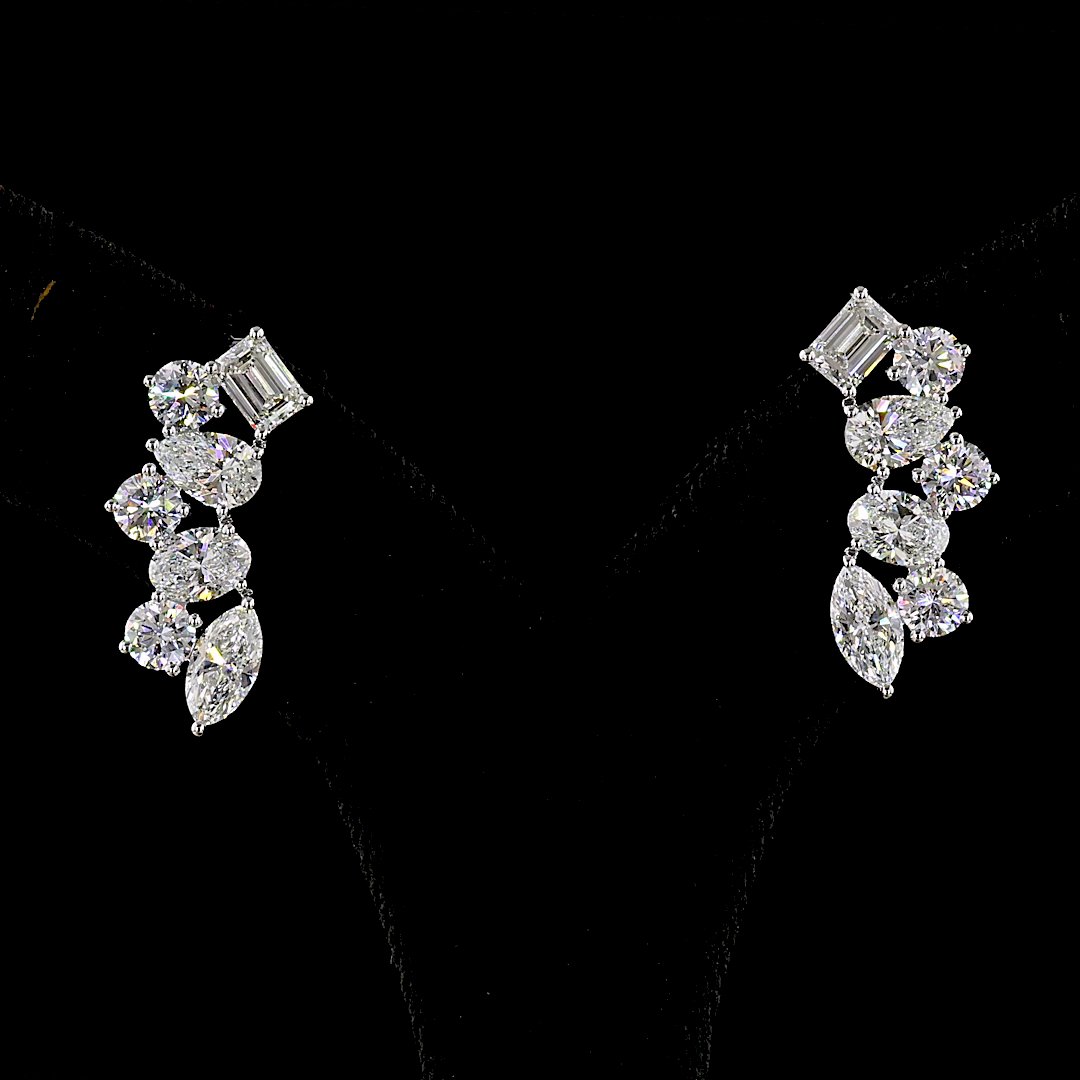 14k white gold ear crawler earrings featuring 6.03ct mixed shape lab grown diamonds.