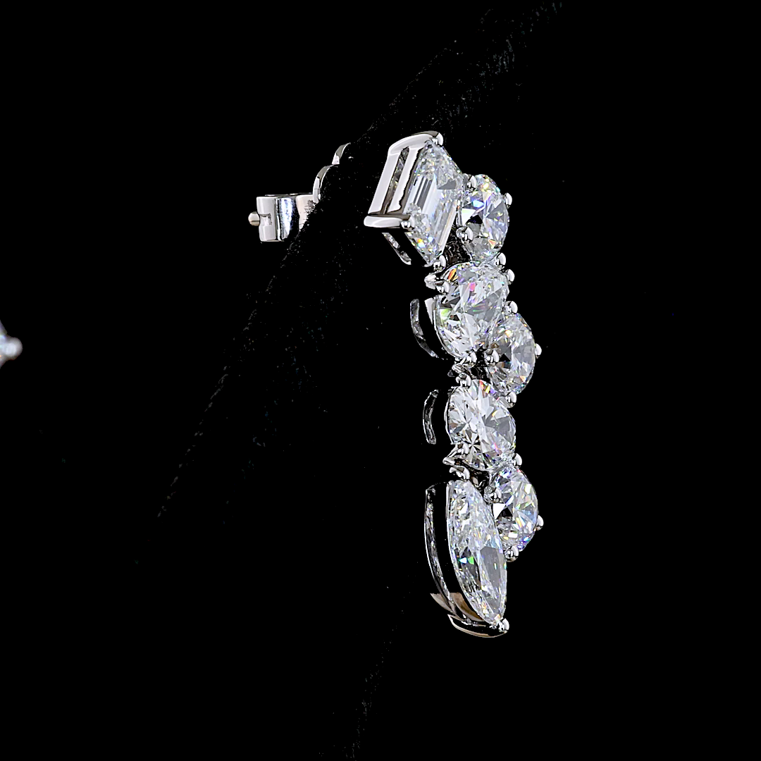 Lab grown diamond ear crawler in 14k white gold with mixed shapes including emerald and marquise.