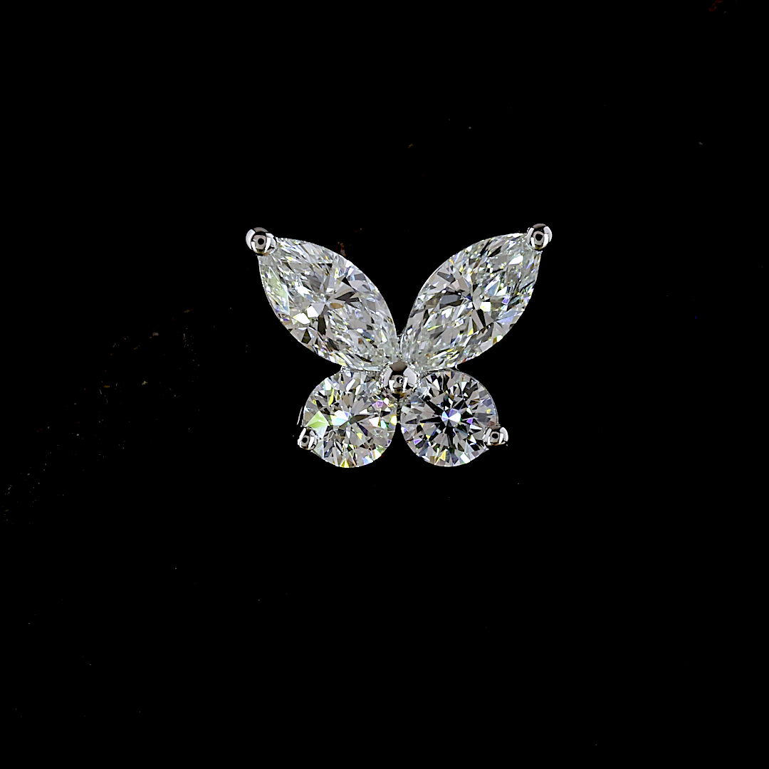 Butterfly stud earring in 14k white gold with marquise and round lab grown diamonds.