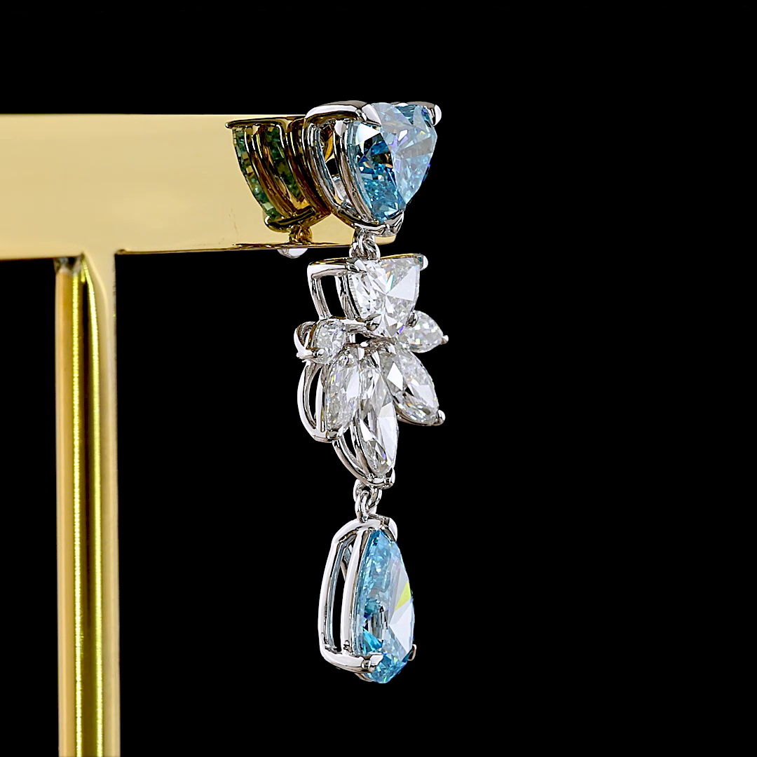 Lab grown diamond chandelier earrings in 14k white gold with fancy blue and white diamonds.