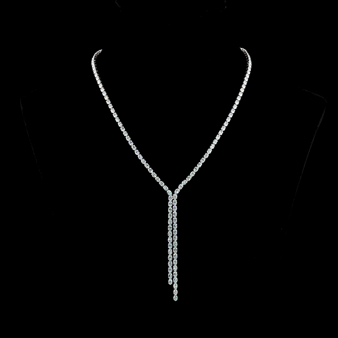 13.89ctw oval cut lab grown diamond lariat necklace in 14k white gold on a black display bust.