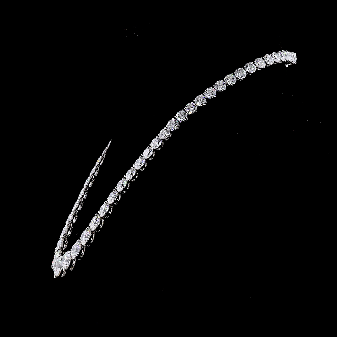 68.51ctw graduated lab grown diamond Riviera necklace in 14k white gold on a black background.