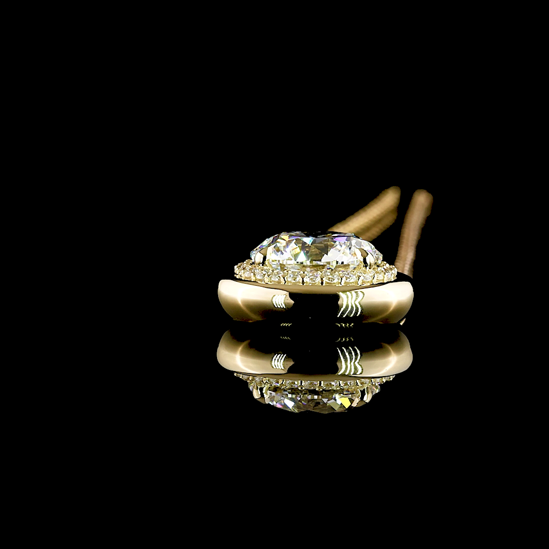 5.32ctw round lab grown diamond halo pendant in 14k yellow gold on a thin chain.