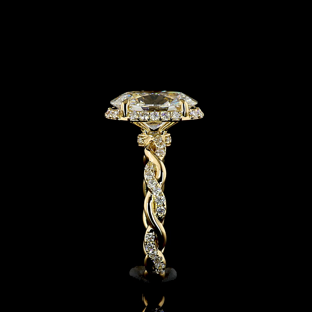 Side view of a 3.55ctw lab grown oval diamond engagement ring in 18k yellow gold with twisted band.