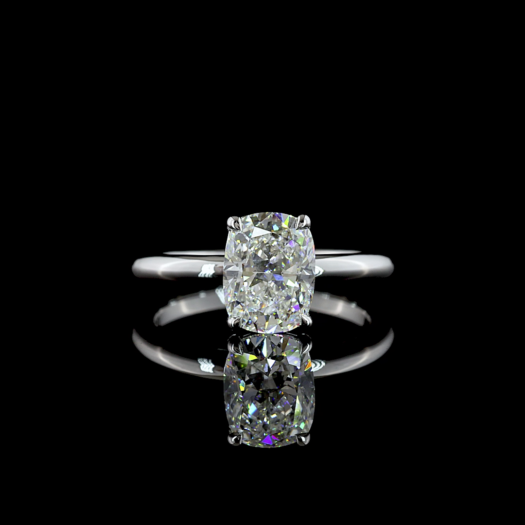 2.01ct lab grown cushion diamond solitaire engagement ring in 14k white gold.