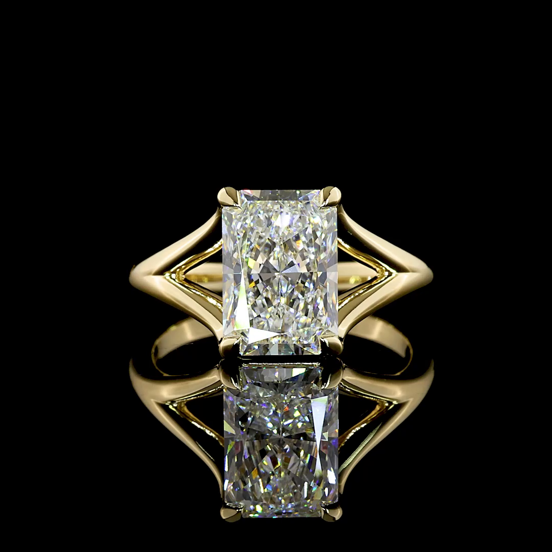 3.12ct lab grown radiant cut diamond engagement ring in 14k yellow gold with a split shank design.