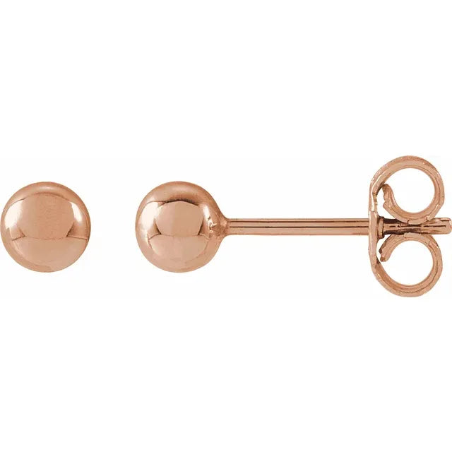 Rose gold round ball stud earrings with butterfly backs.